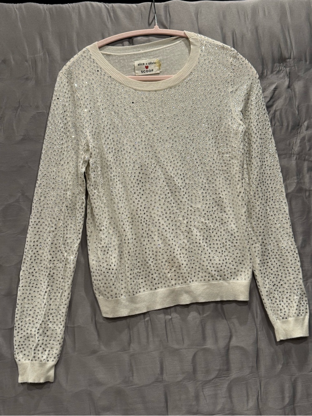 Alice + Olivia Ivory Rhinestone-Embellished Scoop Neck Sweater
Missing stones